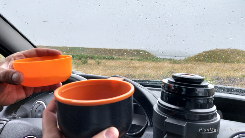 Iceland in winter and thermos of a hot tea 