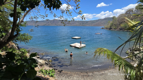 Swimming area at Laguna Apoyo surrounded by tropical vegetation inside an ancient volcanic crater in Nicaragua