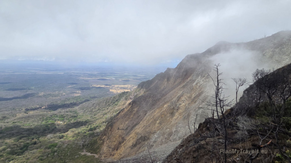 View from the rim of Mombacho Volcano overlooking the volcanic slopes and surrounding landscape of Nicaragua