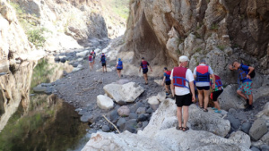 Trekking through the Somoto Canyon with towering rock walls and the Coco River in northern Nicaragua